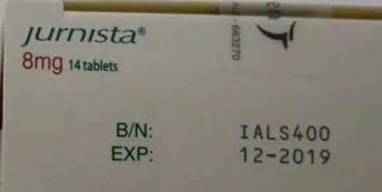 The batch number and expiry date are printed on the end tab of the box