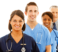 Photo of four smiling medical practitioners